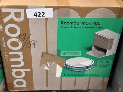 a cardboard box with a picture of a roomba on it