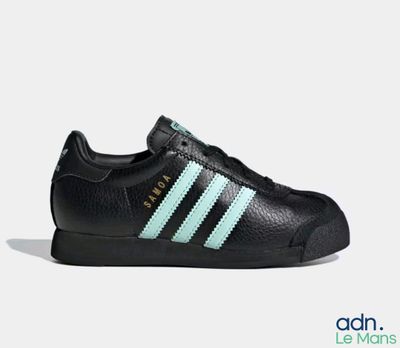 the adidas superstar shoes in black and aqua are on sale
