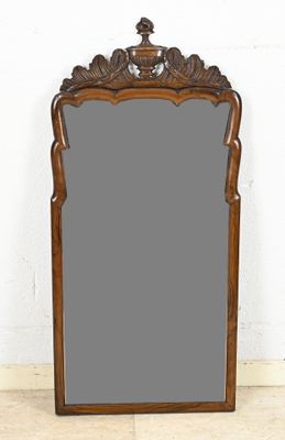 an image of a large mirror sitting on top of a wooden floor