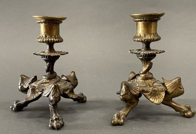 two candles that are sitting on top of each other