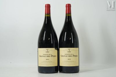two bottles of red wine sitting next to each other on a table