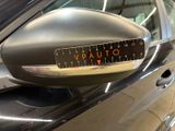an image of a car door mirror with a sticker on it