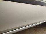 a close up of a car door handle and the door handle is missing