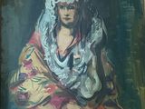tableau représentant une femme coiffée d'une coiffe blanche, assise devant un tableau