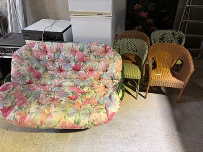 two chairs and a couch in a room