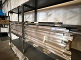 many shelves that are in the middle of a room