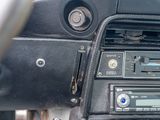 a car dashboard with a radio and other electronics in it