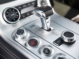 a close up of a car ' s dashboard with buttons and controls