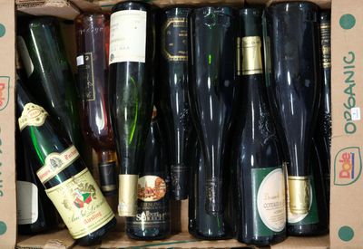 many bottles of wine in a box on the table