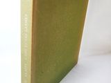 a book that is sitting on a white table