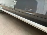 a picture of a car parked on the side of the road