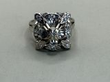 an image of a diamond ring on a table