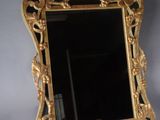 a mirror that is sitting on a table