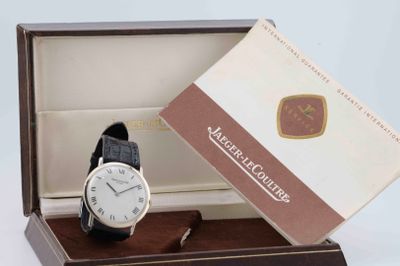 a watch that is in a box on a table