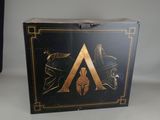 a black box with a gold and black logo on it