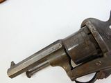 a gun that is sitting on a table