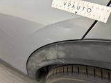 a sticker on the side of a car with a measuring tape attached to it