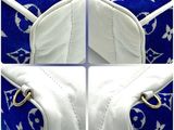 four pictures of a white purse with a blue and white pattern