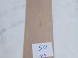 a close up of a piece of wood sitting on top of a table