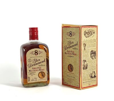 l'image d'une bouteille de whisky posée à côté d'une boîte