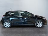 a picture of a black car that is parked in a garage