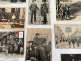 several old black and white photographs of men and women on a wall