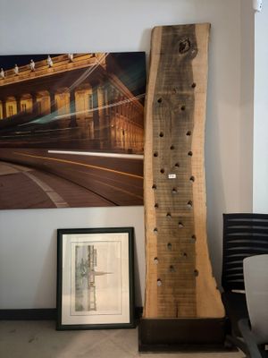 a picture of a picture of a large piece of wood in a room