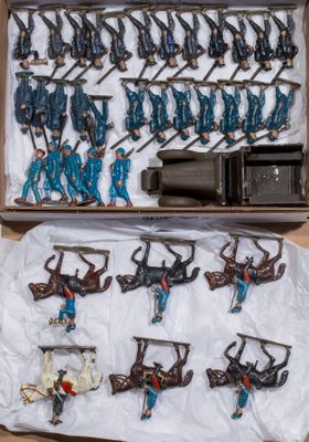 a lot of toy soldiers that are in a box