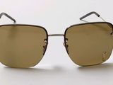 sunglasses on a white surface with a white background