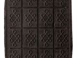 an image of a black door mat with hearts and hearts on it