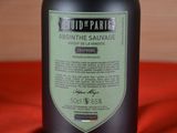 a bottle of wine that is sitting on a table