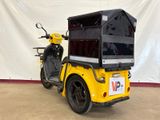 a motorcycle with a trailer attached to the back of it