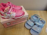 a pair of shoes and a box on a table