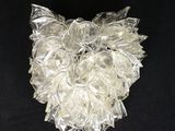 a close up of a glass sculpture on a black surface