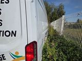 a white van with a sticker on the side of it
