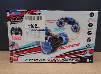 the box of a remote controlled toy car is on a table