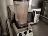 a blender sitting on top of a counter in a kitchen