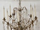 an image of a chandelier made of glass and metal