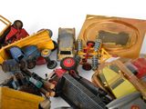 many different types of toy cars and trucks on the table