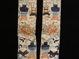 pair of chinese silk neck ties with blue and orange floral designs
