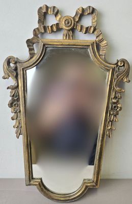 a mirror that is sitting on a table