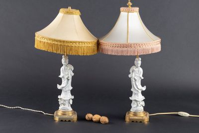 pair of white and gold table lamps with fringe lampshads
