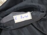 an image of a label on a black jacket