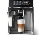 a close up of a coffee machine with a cup of coffee