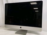 a computer monitor sitting on top of a white table