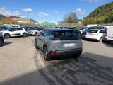 a lot of cars parked in a parking lot on a sunny day
