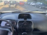 dashboard view of a car with a lot of cars in the background