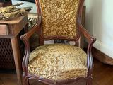 a chair that is sitting in the corner of a room