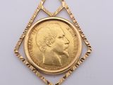 an image of a gold medal with a face of a man on it