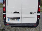 a white van that is parked in a parking lot